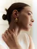 Elegant Snail Style Earrings sold by COMMENSE