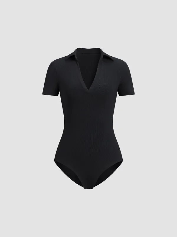 Solid V-Neck Bodysuit sold by COMMENSE