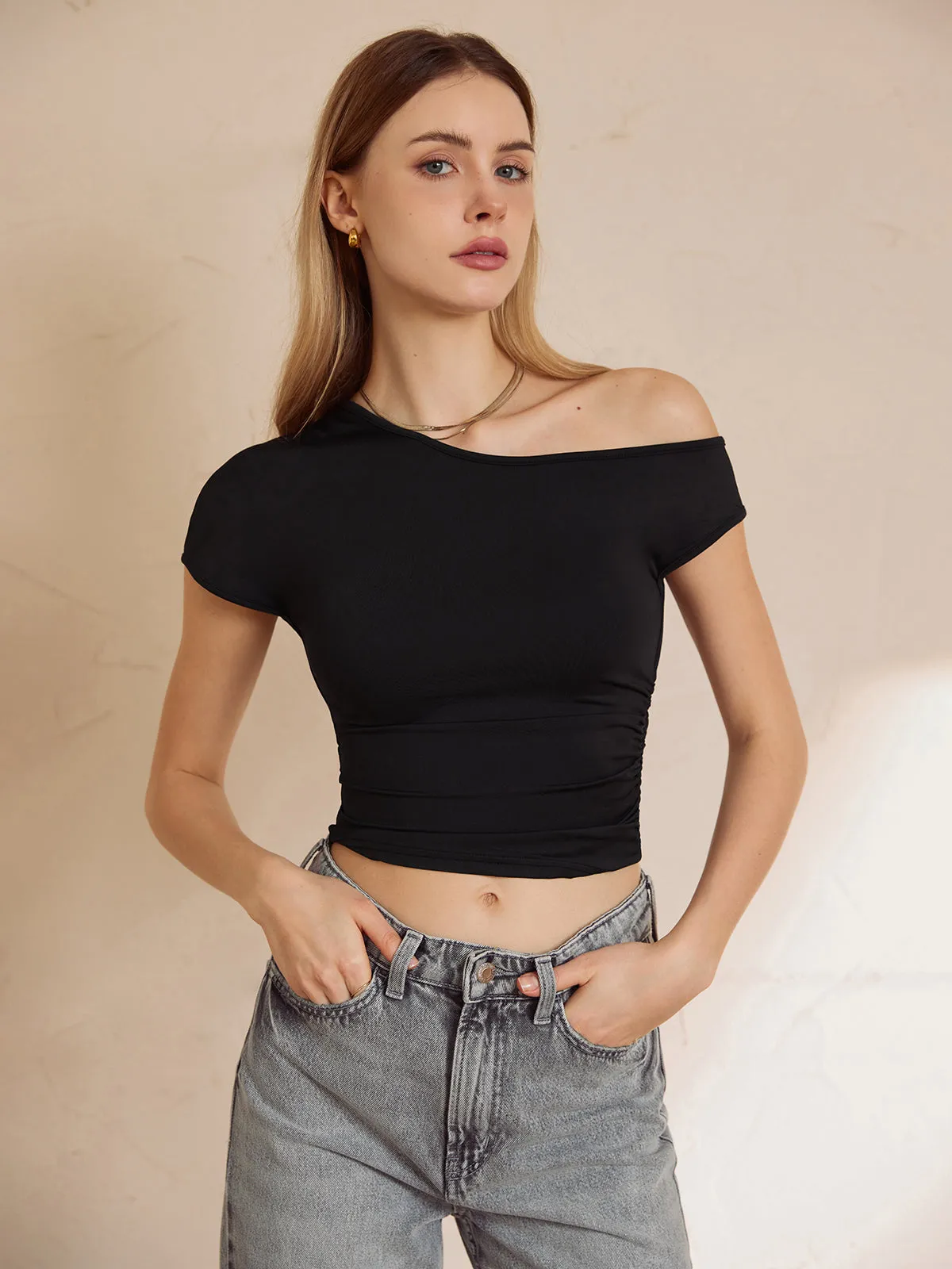 Asymmetrical Neck Crop Top sold by COMMENSE