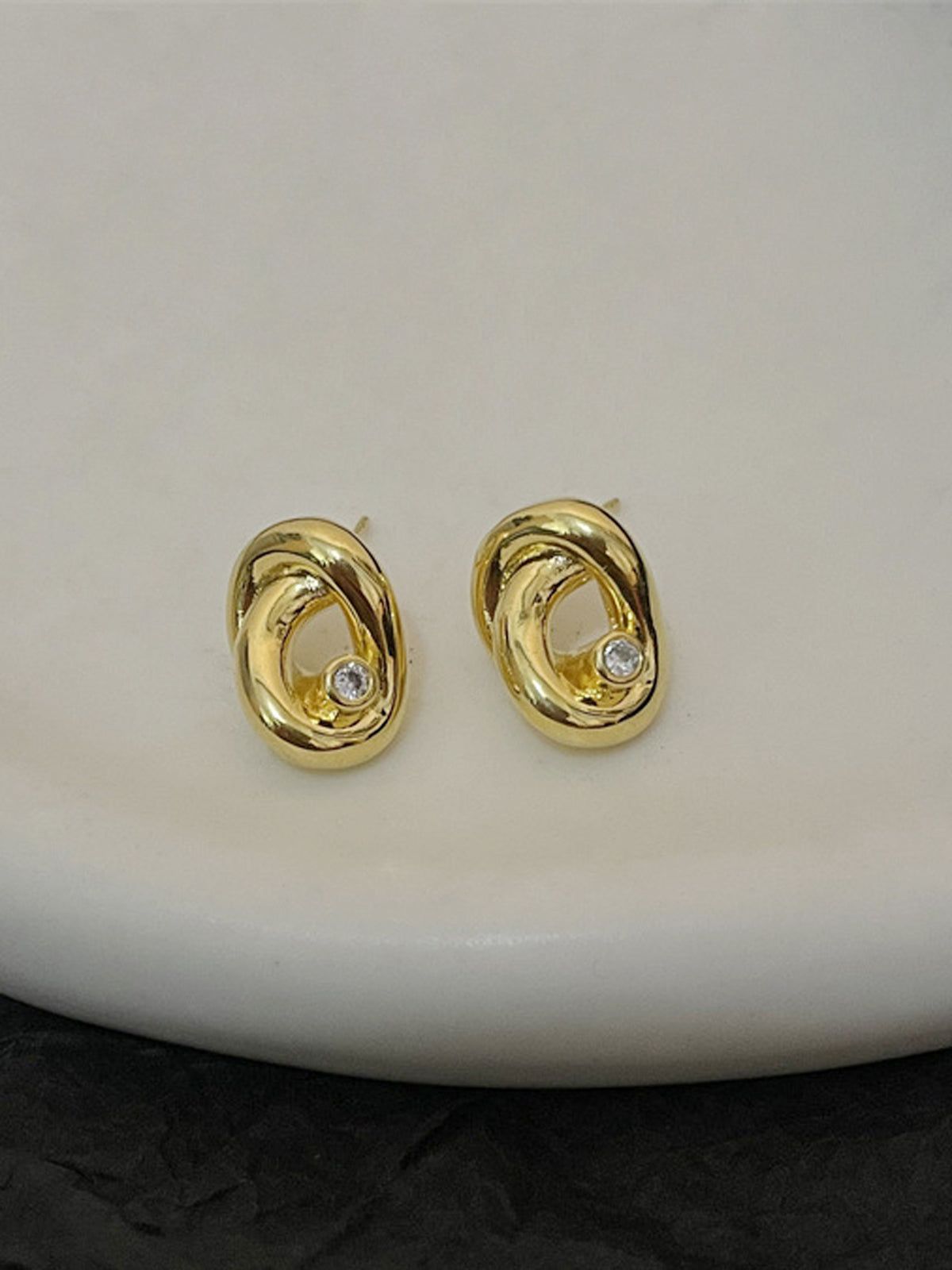 Diamante Criss Cross Earrings sold by COMMENSE