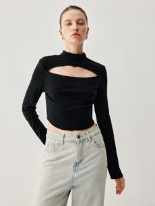 Knit Cut Out Mock Neck Long Sleeve Crop Top sold by COMMENSE