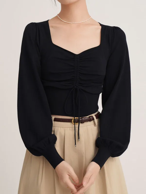 Leisurely Drawstring Puff Sleeve Knit Top sold by COMMENSE