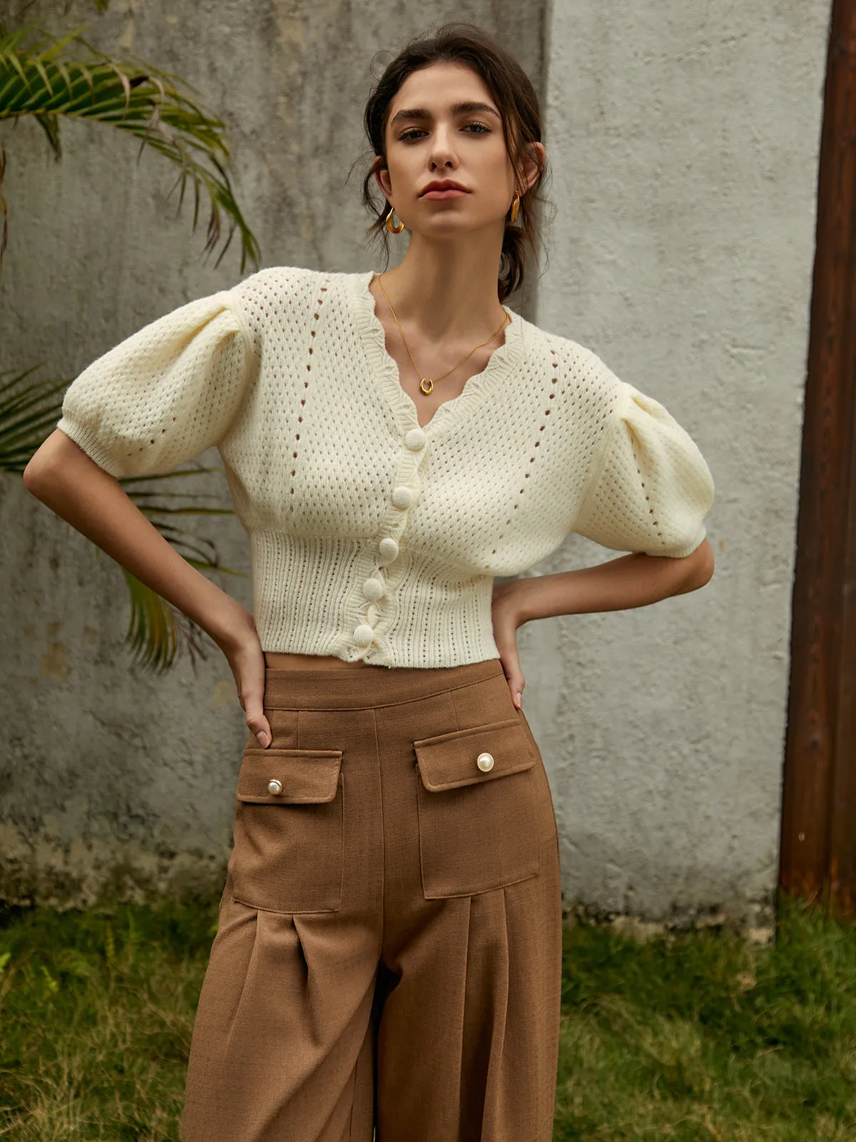 Frenchy Puff Sleeve Knit Top sold by COMMENSE