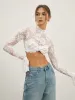 Rose Lace Mesh Mock Neck Crop Top sold by COMMENSE
