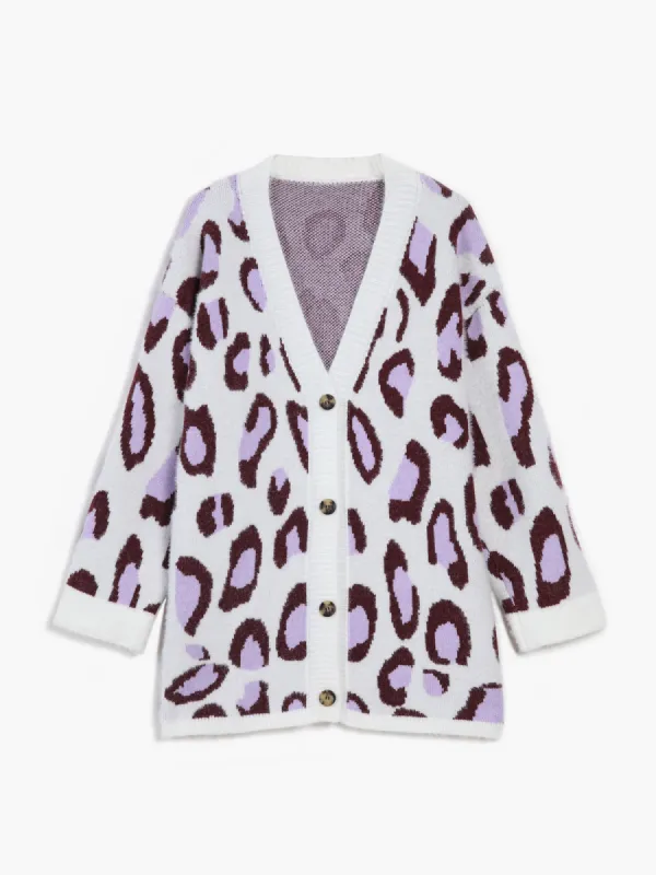Leopard Print Fuzzy Cardigan sold by COMMENSE