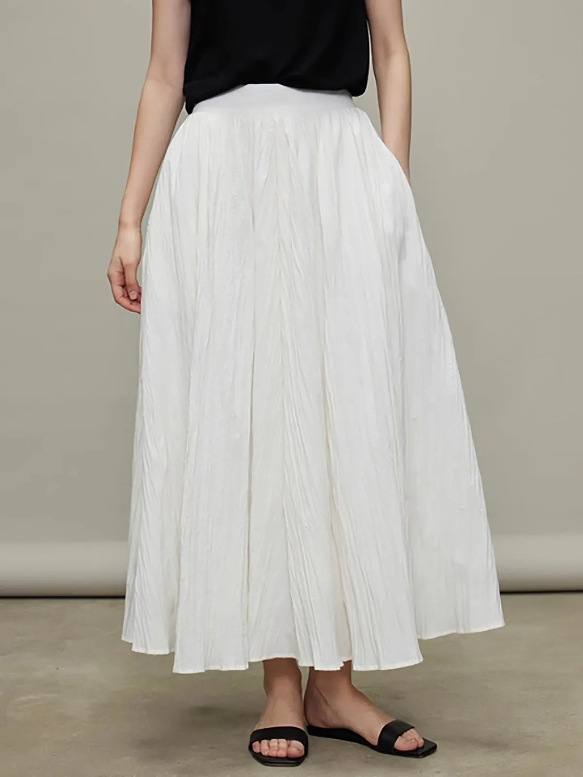 Pockets Pleated Maxo Skirt sold by COMMENSE