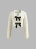 Bow Knotted Cozy Crop Knit Top sold by COMMENSE