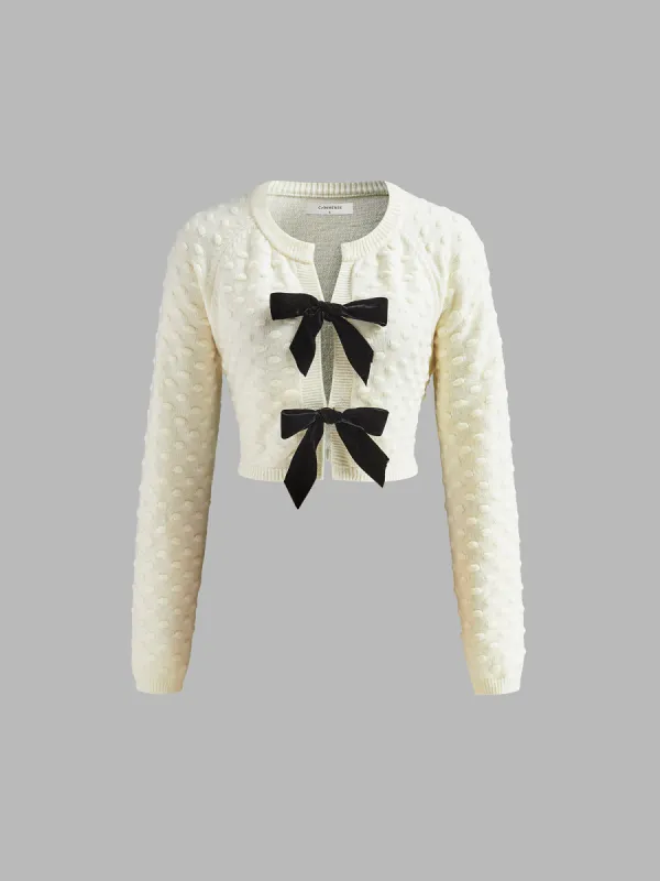 Bow Knotted Cozy Crop Knit Top sold by COMMENSE