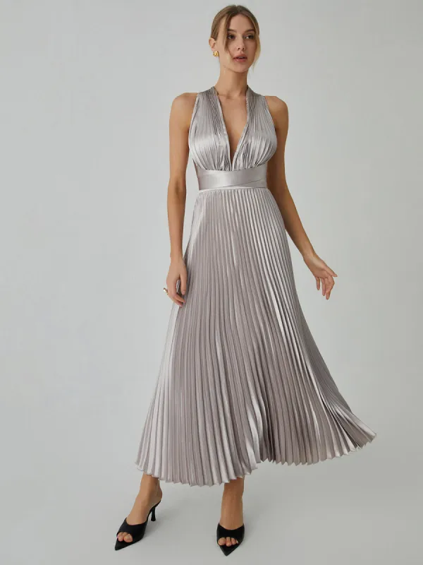 Knotted Halter Pleated Long Dress sold by COMMENSE
