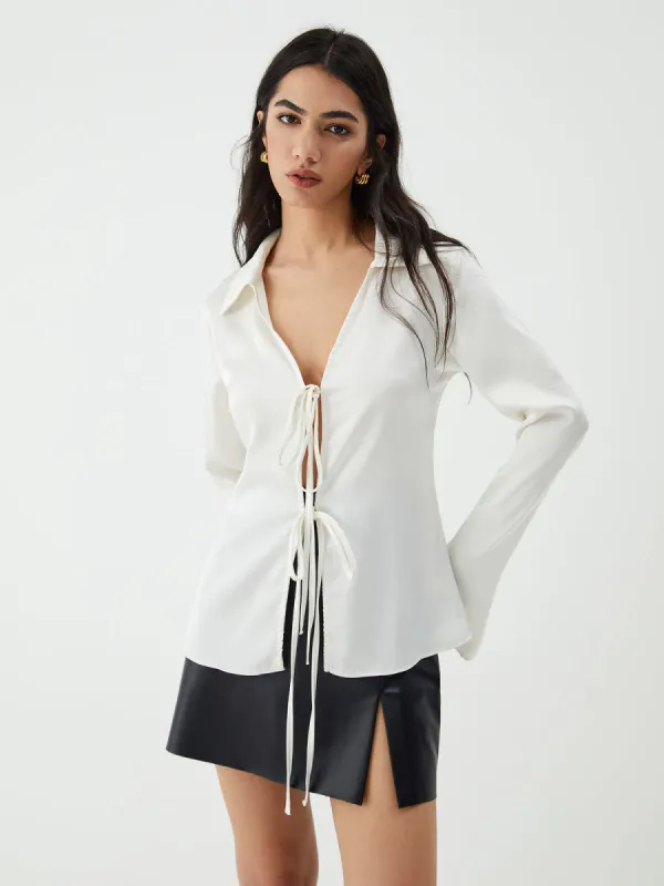 Tie Up V-Neck Long Sleeve Blouse sold by COMMENSE
