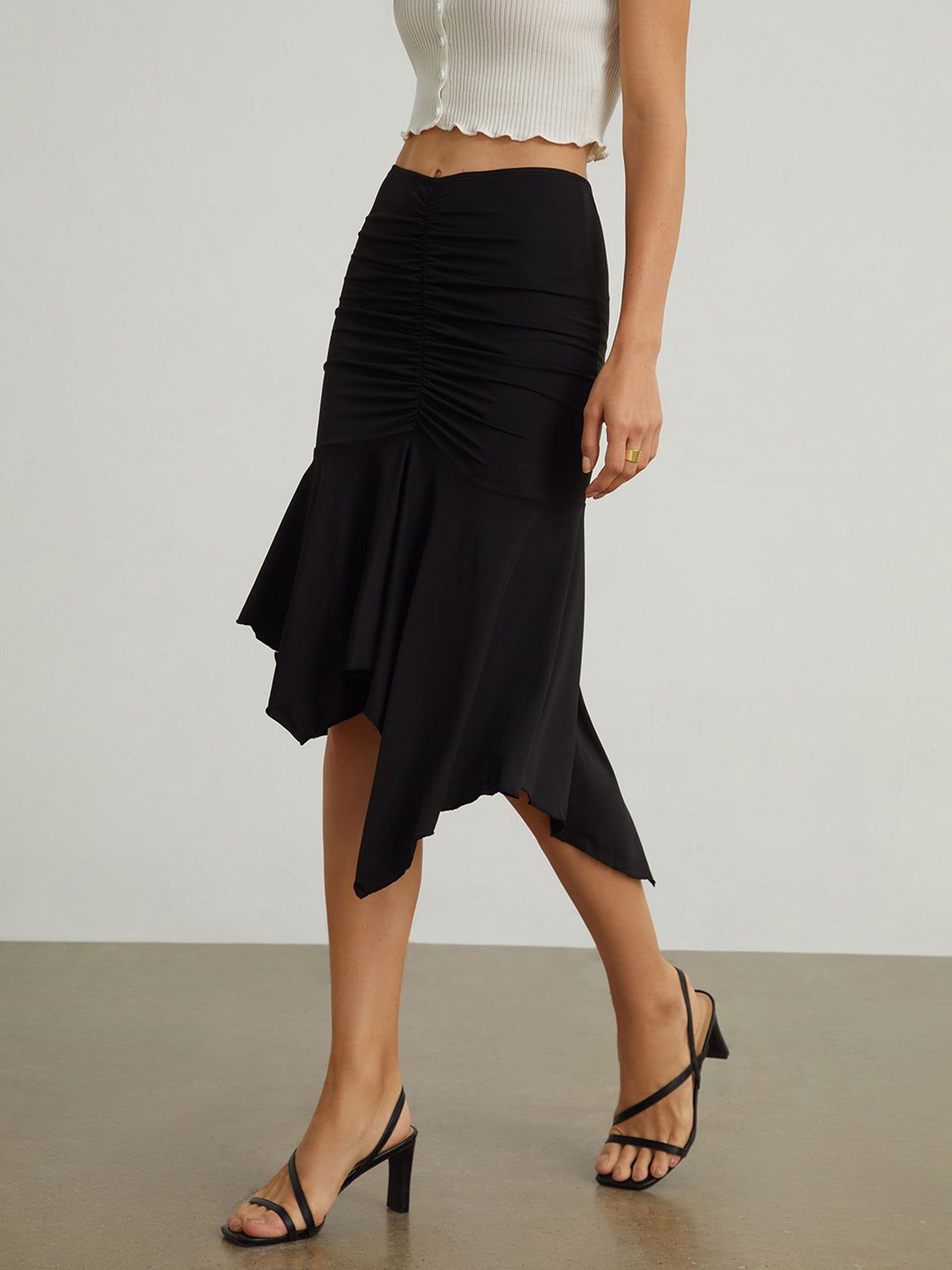 Oblique Hem Ruched Skirt sold by COMMENSE
