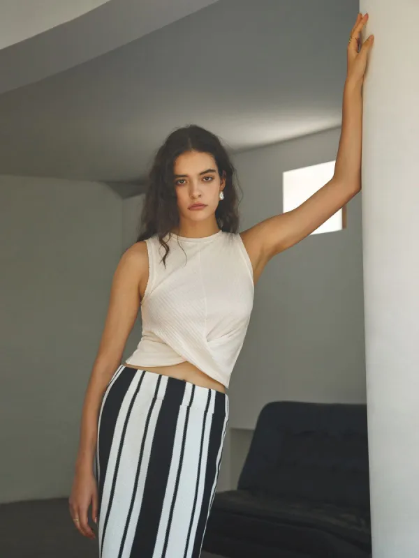 Criss Cross Wrap Rib Sweater Vest sold by COMMENSE