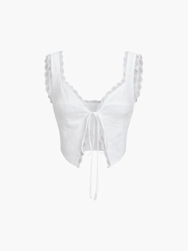 Fly Away Tie Front Eyelet Lace Trim Crop Top sold by COMMENSE
