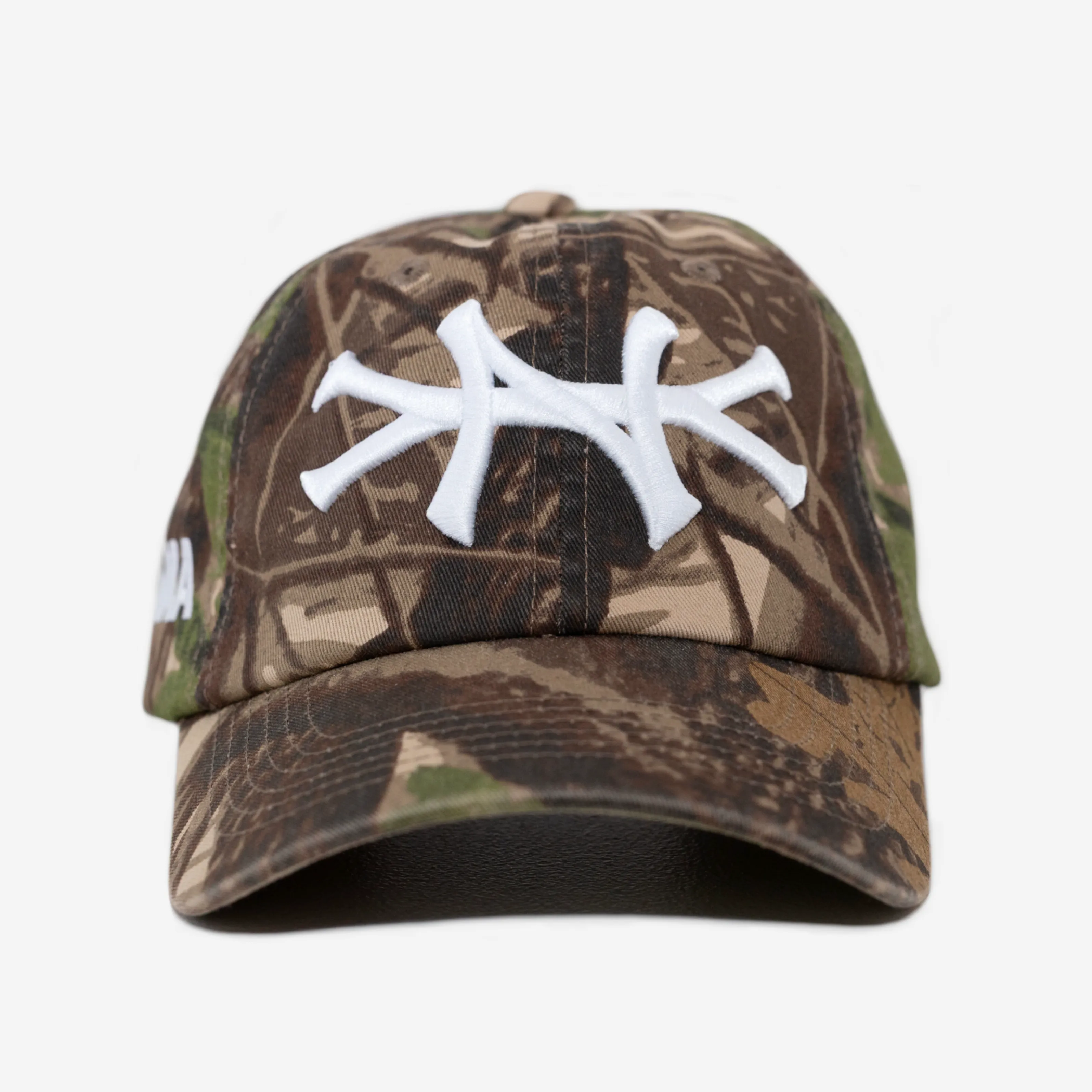 NY FOREST CAMO CURVED BRIM HAT sold by oMA Studios