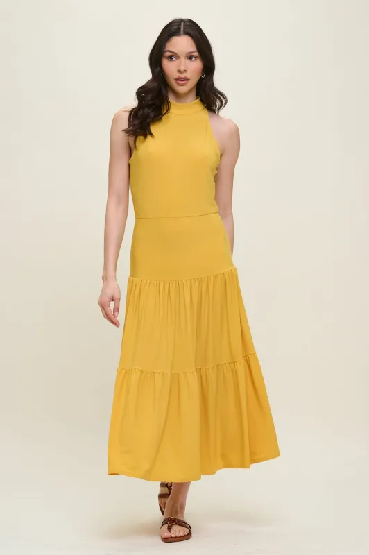 Freja Sleeveless Mock Neck Tiered Midi Dress sold by West k
