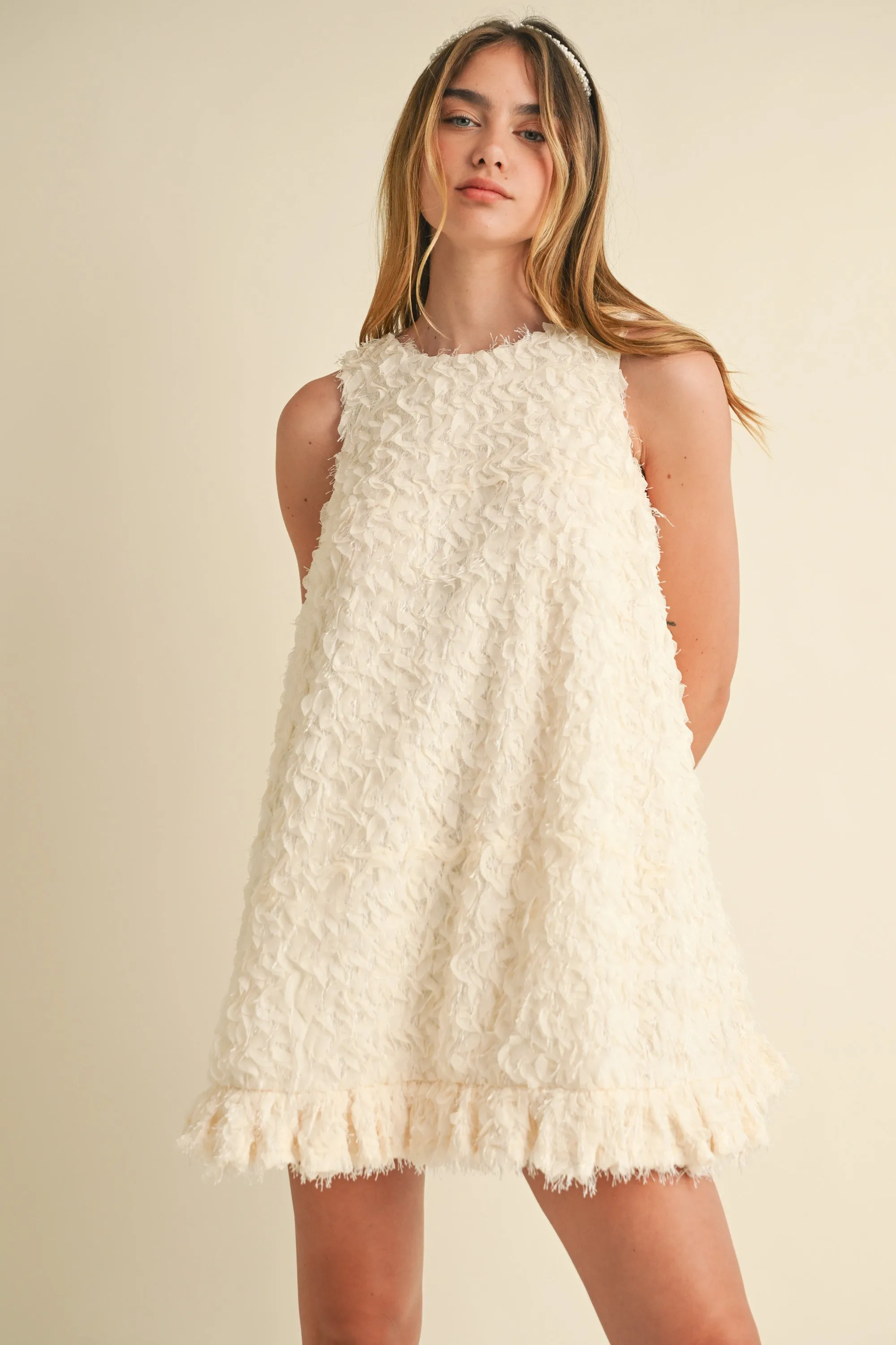 ORSON SLEEVELESS APPLIQUE RUFFLE MINI DRESS sold by MABLE