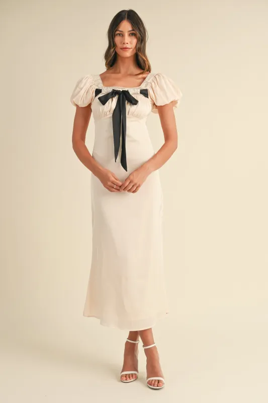ODESSA BOW DETAILED MIDI DRESS sold by MABLE