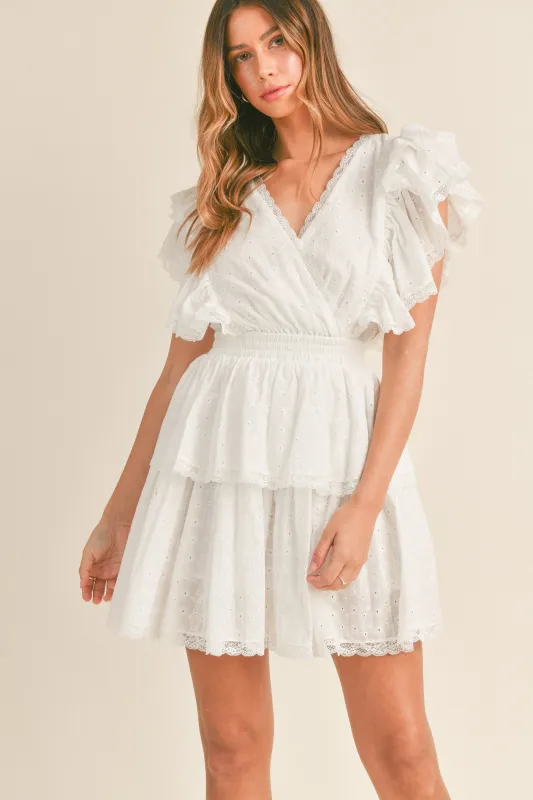 BROOKLYNN EMBROIDERED MINI DRESS sold by MABLE