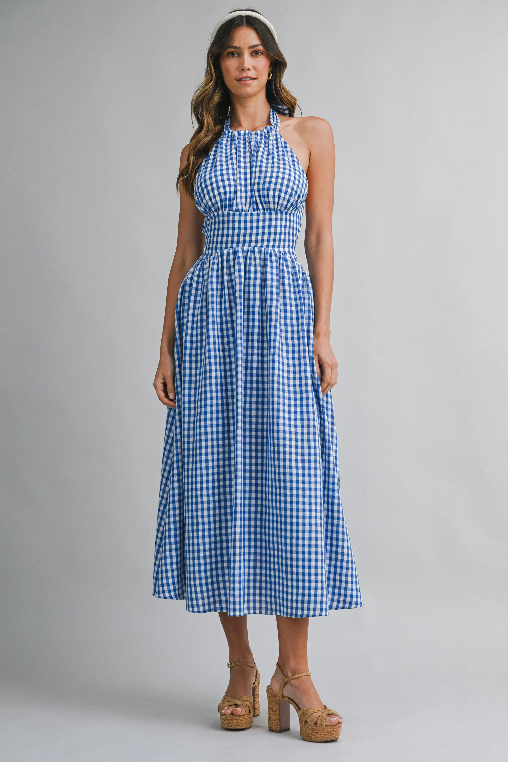 IRIDIA HALTER NECK BACK BOW MIDI DRESS sold by MABLE