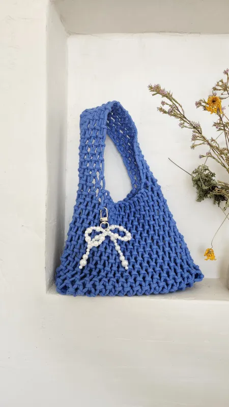 Pearl Bow Bag Charm sold by Things Between