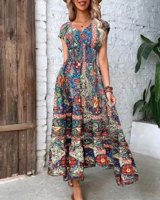 Smocked short sleeve midi dress sold by Miss Sparkling