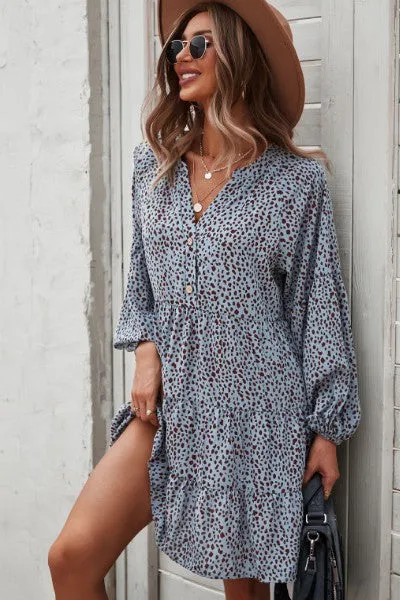 Dotted ruffled long sleeve tiered dress sold by Miss Sparkling