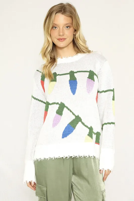 Xmas lights sweater sold by Miss Sparkling