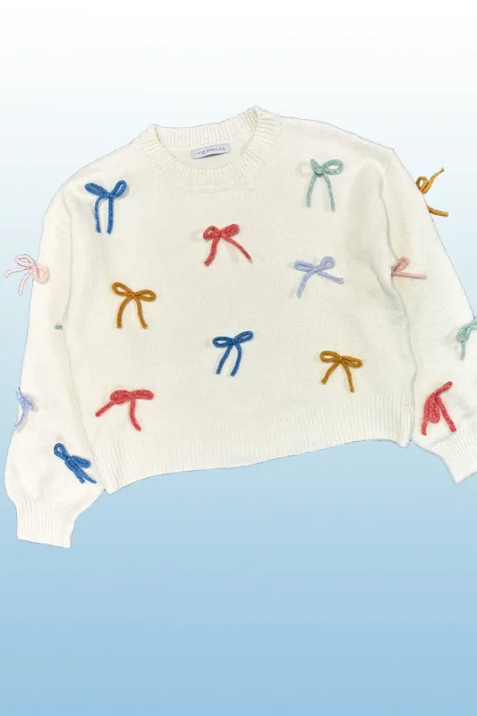 All over Bow knit sweater sold by Miss Sparkling