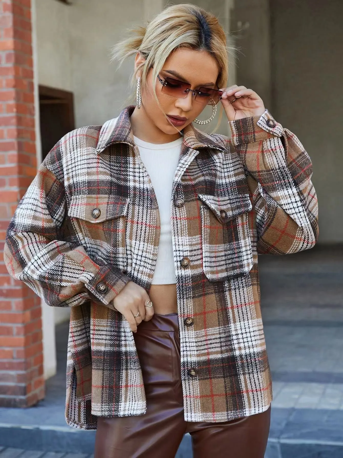 Plaid jacket sold by Miss Sparkling