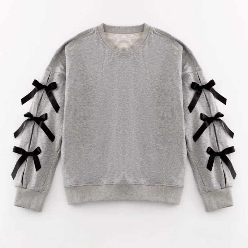 Oversized bow crewneck sweater sold by Miss Sparkling