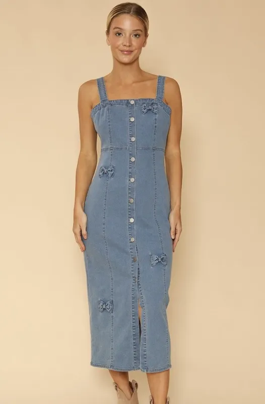 Denim dress with bow detailing sold by Miss Sparkling