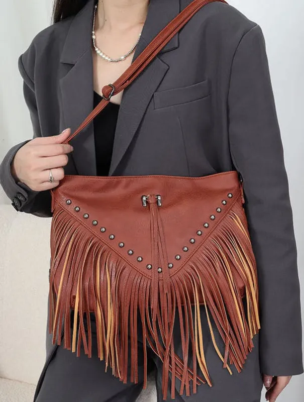 Fringe crossbody bag sold by Miss Sparkling