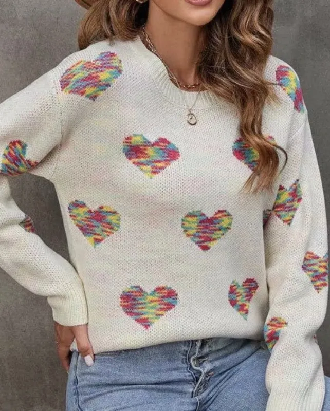 Multicolored heart sweater sold by Miss Sparkling