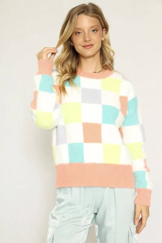 Fuzzy multicolor check sweater sold by Miss Sparkling