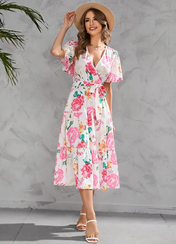 V-neck floral tiered midi dress sold by Miss Sparkling