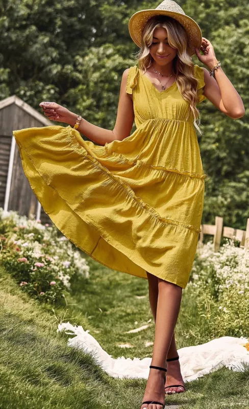 Tiered V neck dress with ties made by Miss Sparkling
