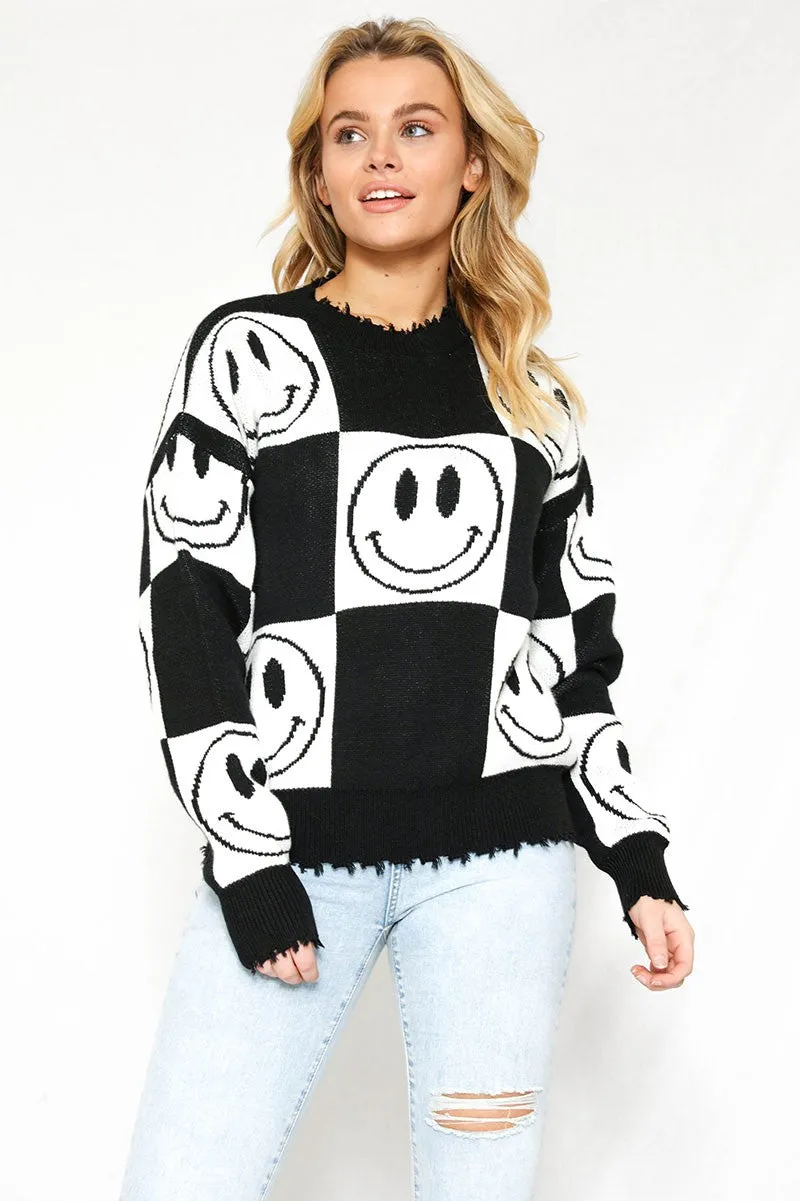 Checkered Smiley Sweater sold by Miss Sparkling