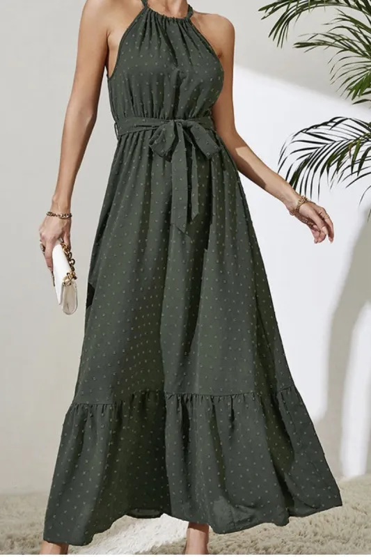 Dotted halter maxi dress sold by Miss Sparkling