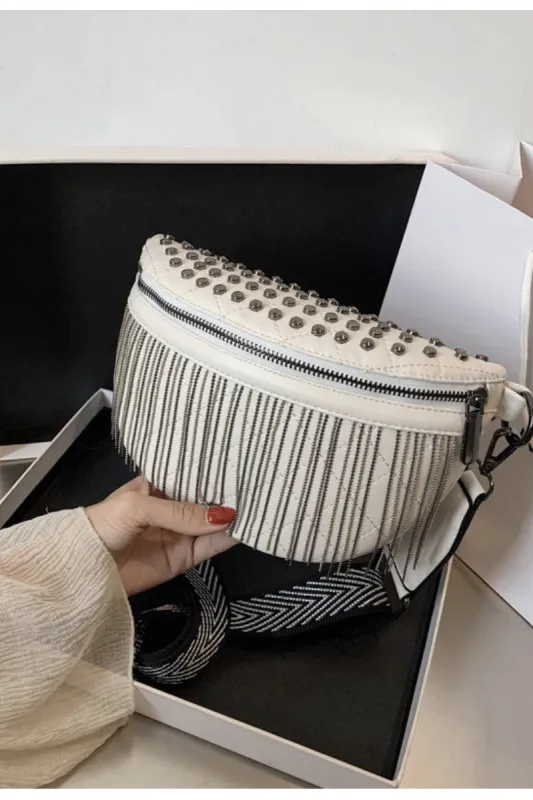 Fringe studded crossbody bag sold by Miss Sparkling