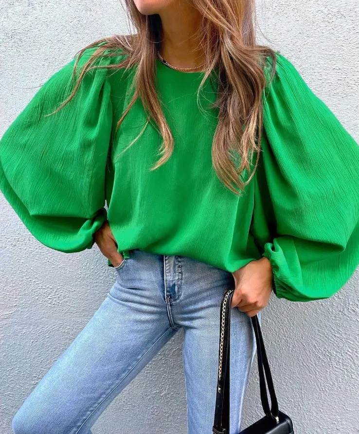 Puff sleeve top sold by Miss Sparkling