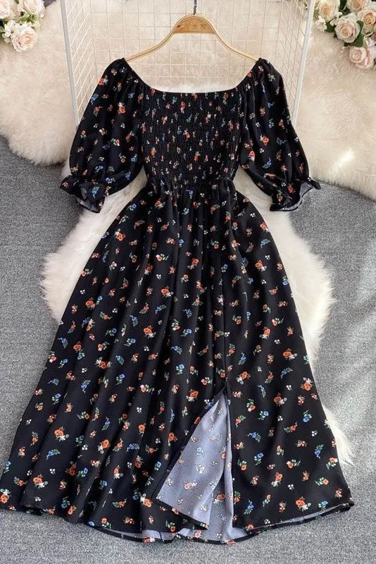 Floral smocked midi dress sold by Miss Sparkling