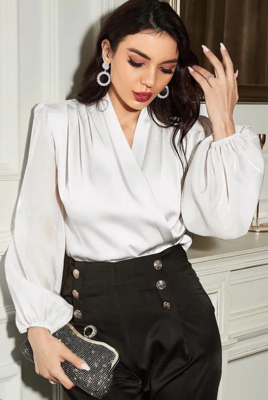 Silk long sleeve blouse sold by Miss Sparkling