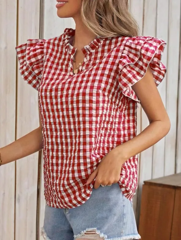 Gingham blouse sold by Miss Sparkling