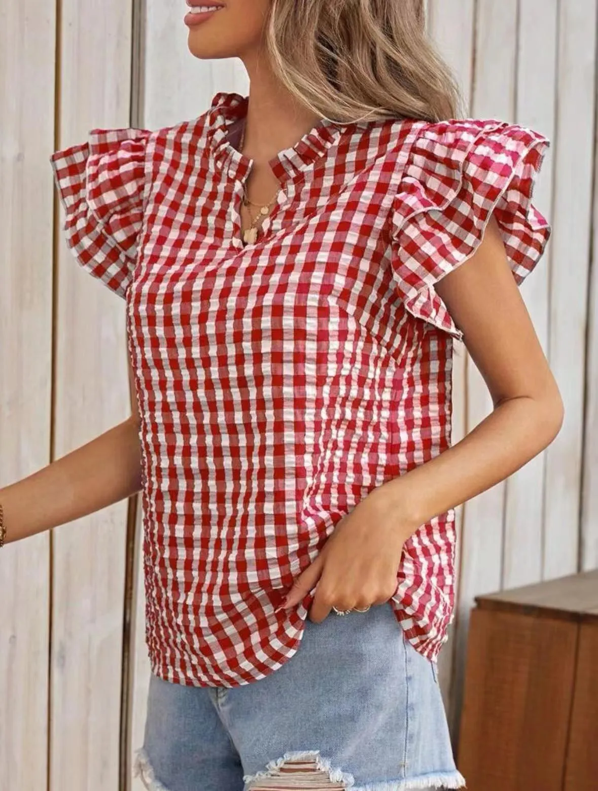 Gingham blouse sold by Miss Sparkling