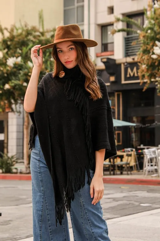 Button Neck Fringe Poncho sold by Leto Collection