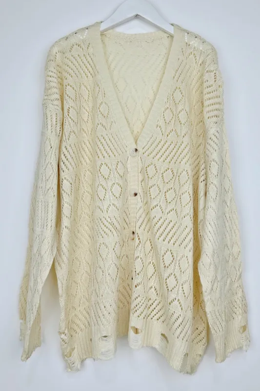 Vintage Cozy: Retro Frayed Hem Diamond Knit Pullover made by Leto Collection