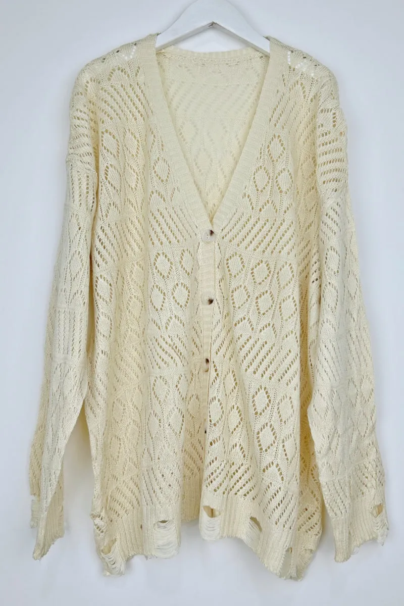 Vintage Cozy: Retro Frayed Hem Diamond Knit Pullover sold by Leto Collection