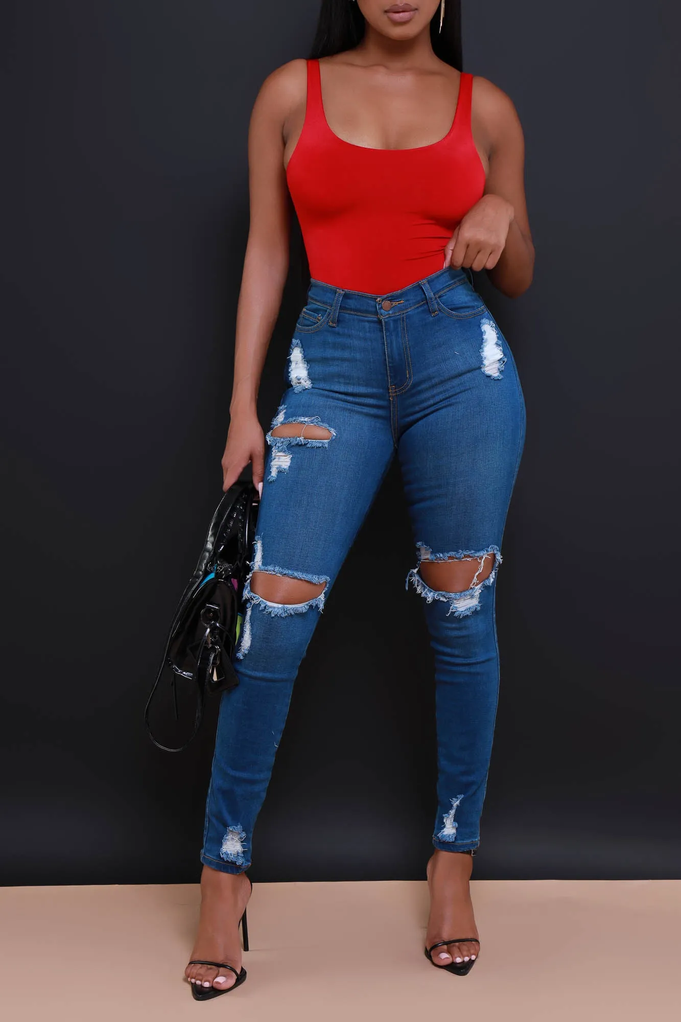 No Favors Distressed Stretch Skinny Jeans - Medium Wash sold by Swankaposh