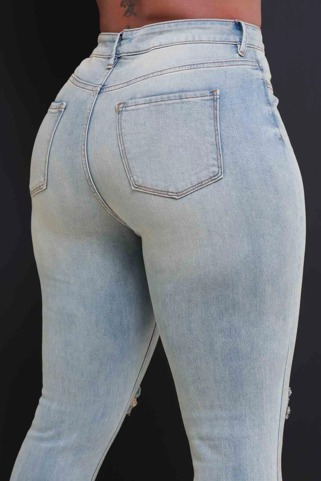 Zone Out High Rise Distressed Skinny Jeans - Light Wash sold by Swankaposh product image thumbnail 2