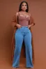 Let's Meet High Rise Wide Flare Jeans - Medium Wash sold by Swankaposh